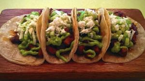 The Barriga de Puerco taco, a taco made with slow-roasted pork belly, adobo, salsa verde cruda, cucumber, and queso fresco is a dish not to be missed at Bein Trucha on State Street in Geneva. (Beth Casey, Beacon-News)